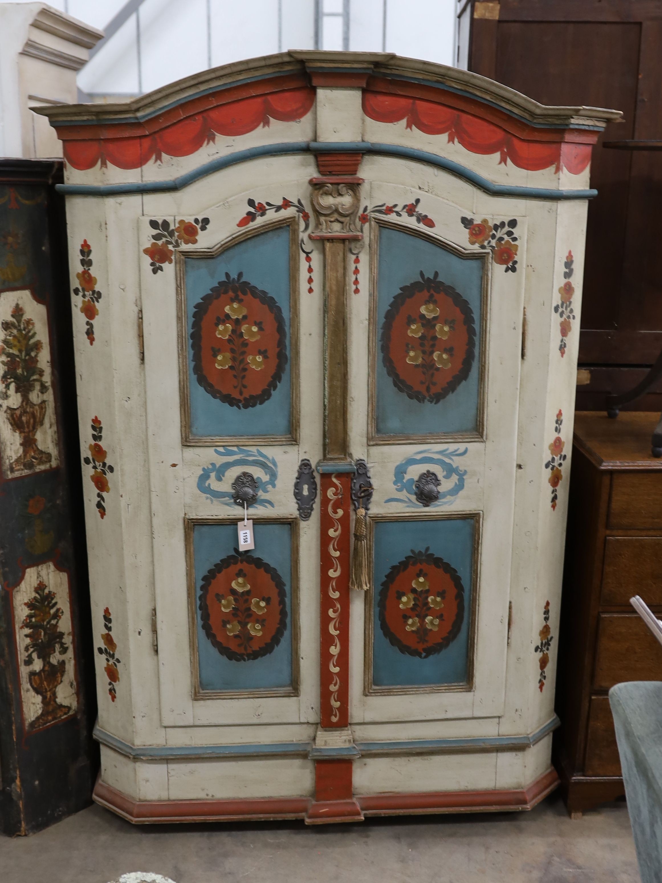 An early 19th century Tyrolean painted pine armoire, width 122cm, depth 62cm, height 186cm